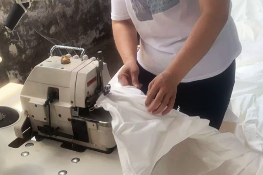 염색공장 생산 - 회색천 재봉 헤드 부분